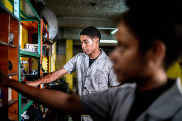 Auto mechanics organizing the shelf on a repair shop