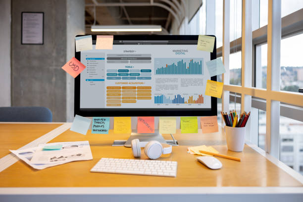 Close-up on a computer showing a marketing strategy for a digital business at a coworking office