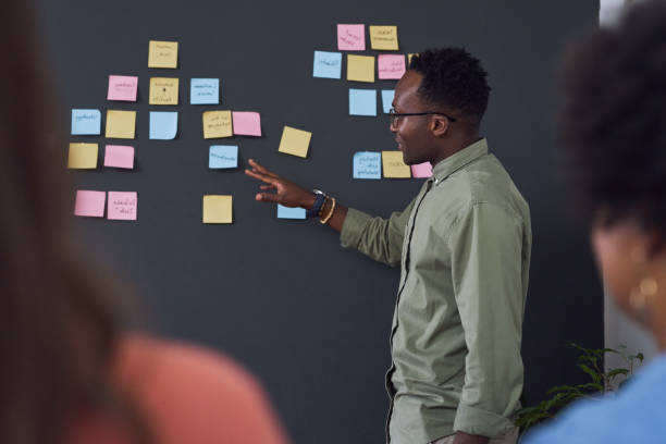 Shot of a team of young businesspeople having a brainstorming session in a modern office