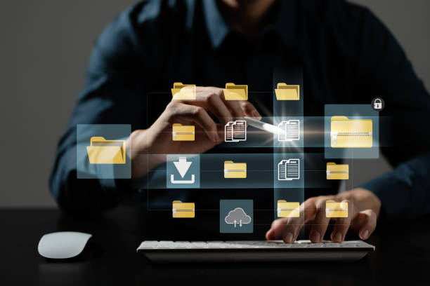 Cloud computing concept. Businessman using computer to backup storage data Internet technology. backup online documentation database and digital file storage system or software, file access. Cloud.